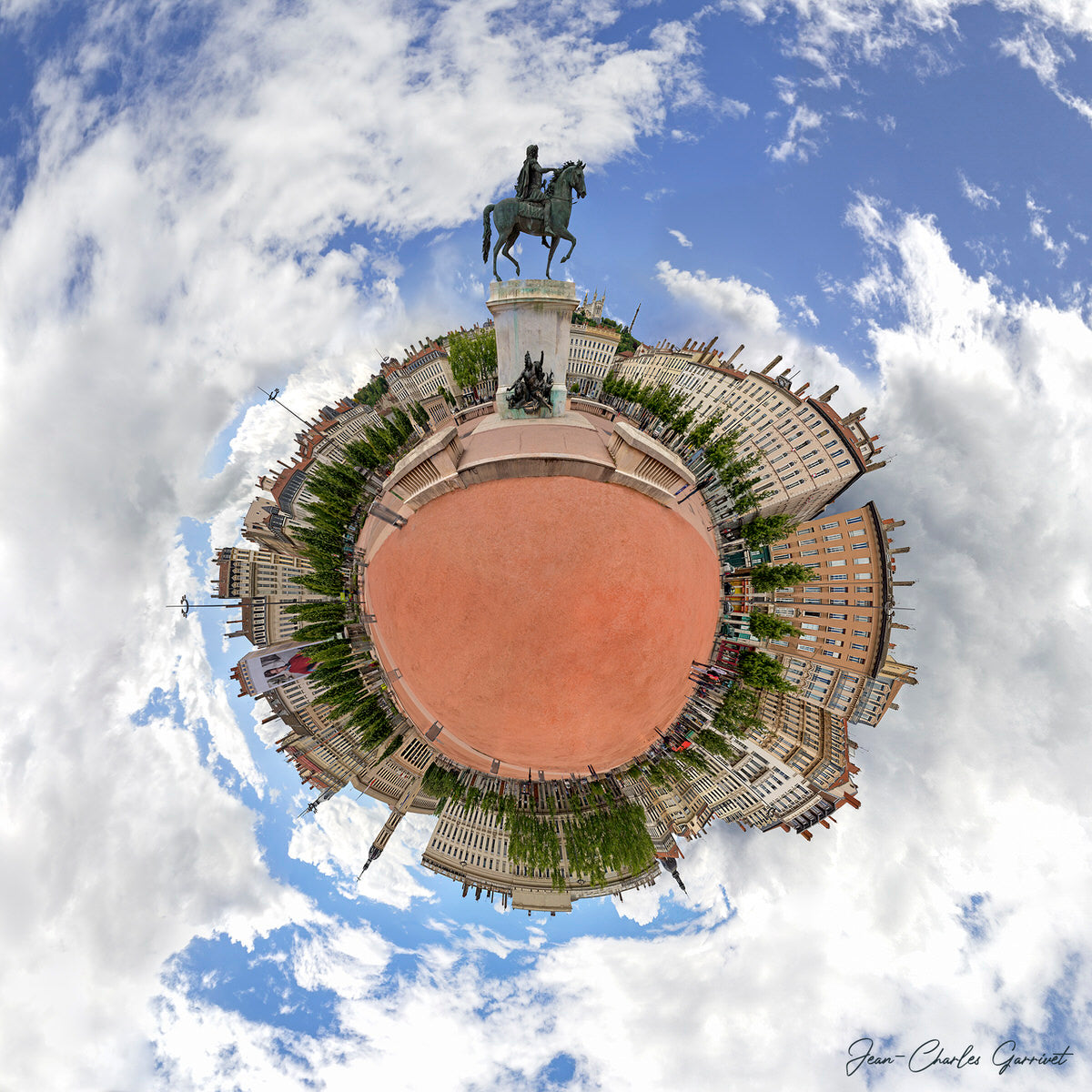 360-degree view of a circular cityscape with a statue on a pedestal.